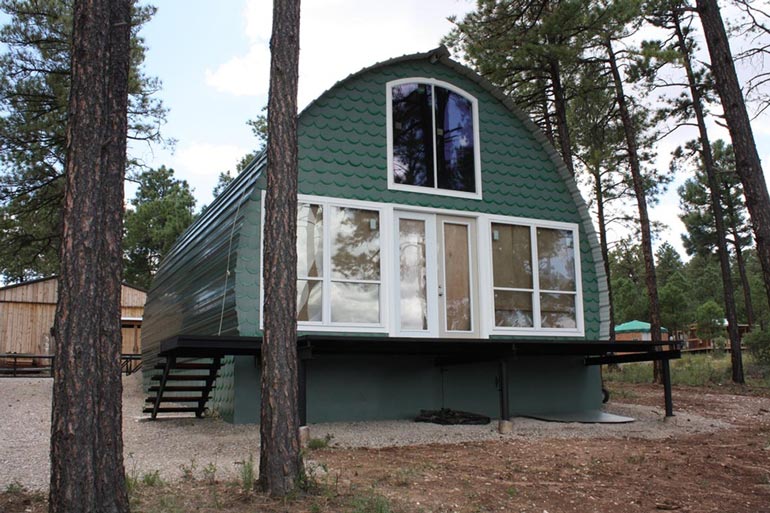  The front entrance has large magnificent double glass doors and two full-length windows.