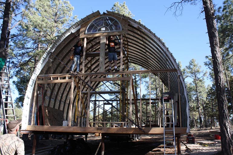 Construction phase of the Arched Metal Cabin.
