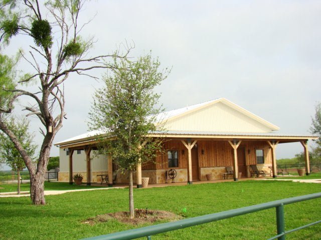 The front porch assures a very relaxing view of the countryside, plus it is majorly made from wood to make it match the soothing ambiance of the green surroundings.