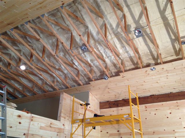 Construction of the pole barn home ceiling.
