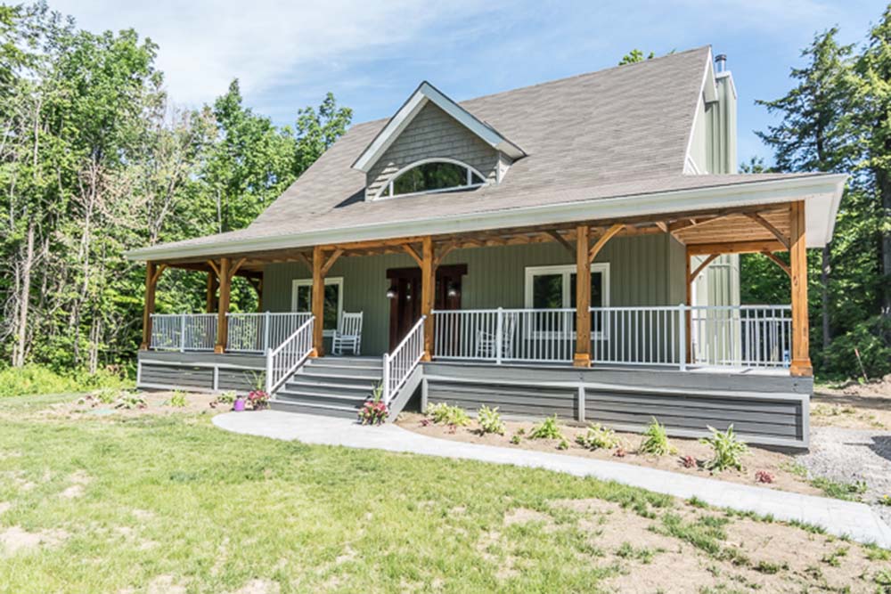 Angled exterior shot of the Beautiful Dutch Saltbox Home