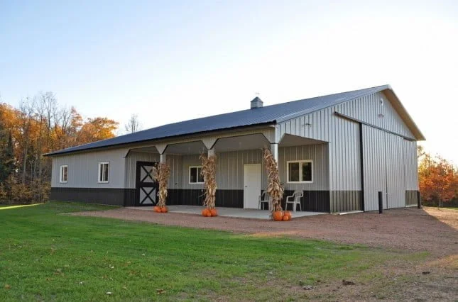One story metal building workshop with sliding barn doors constructed by Wick Buildings