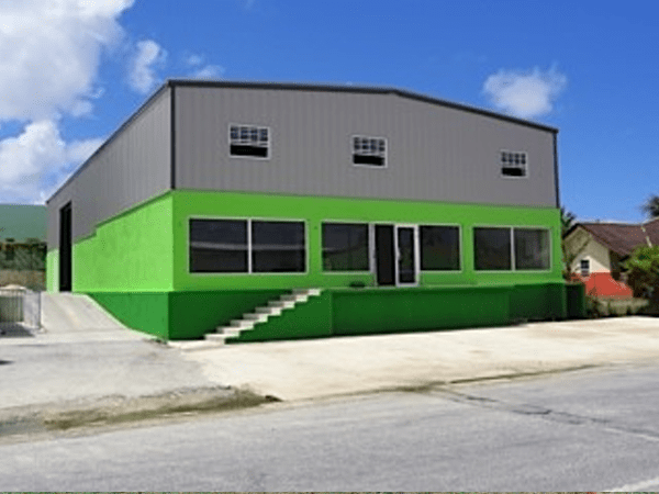 Duro steel building with bright green and grey siding