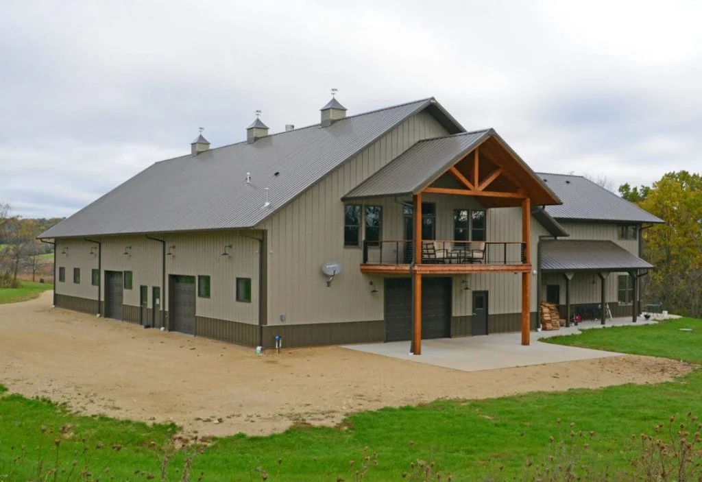 Huge post frame shouse in brown colors manufactured by Wick Buildings in US