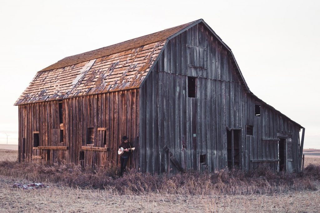 Old abandoned wooden pole barn.