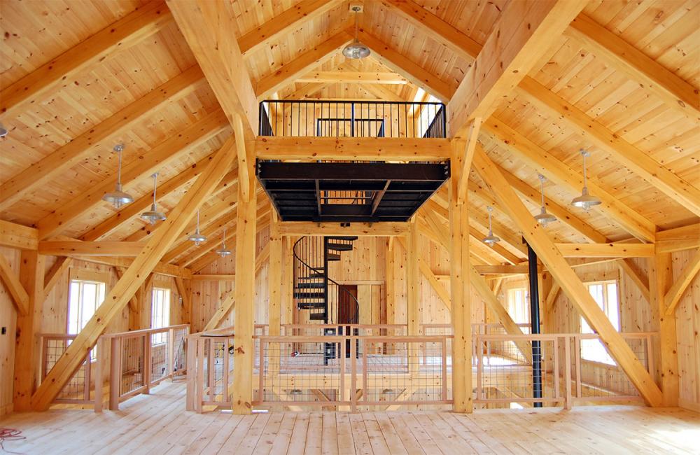 Outstanding wooden pole barn interior constructed by New Energy Works