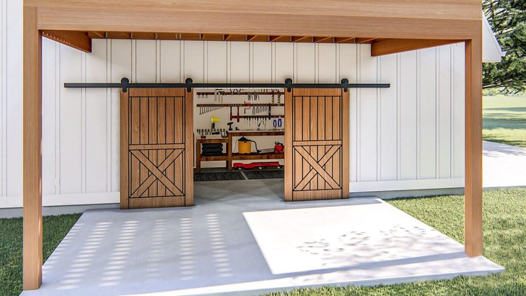 Covered patio and sliding barn type doors with the workshop inside.
