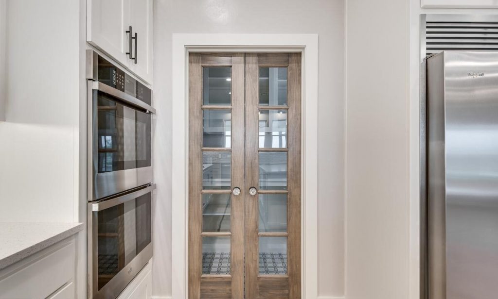 View of the pantry access from the kitchen.