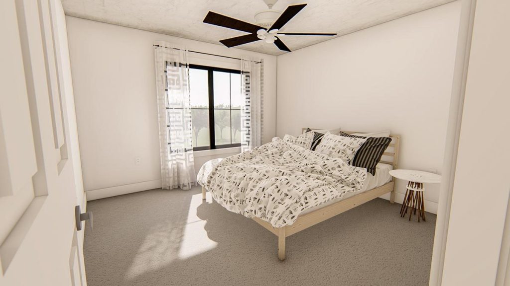 Bedroom w/ carpet flooring full bed and side table, window, ceiling fan.