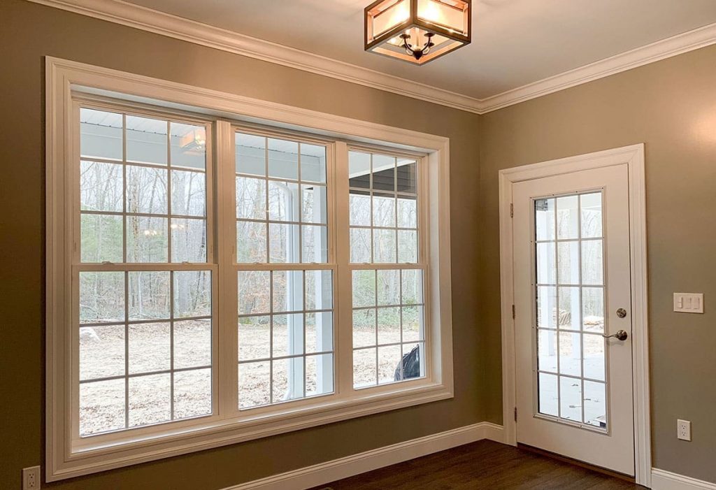 Study room/bedroom view with double-hung windows.