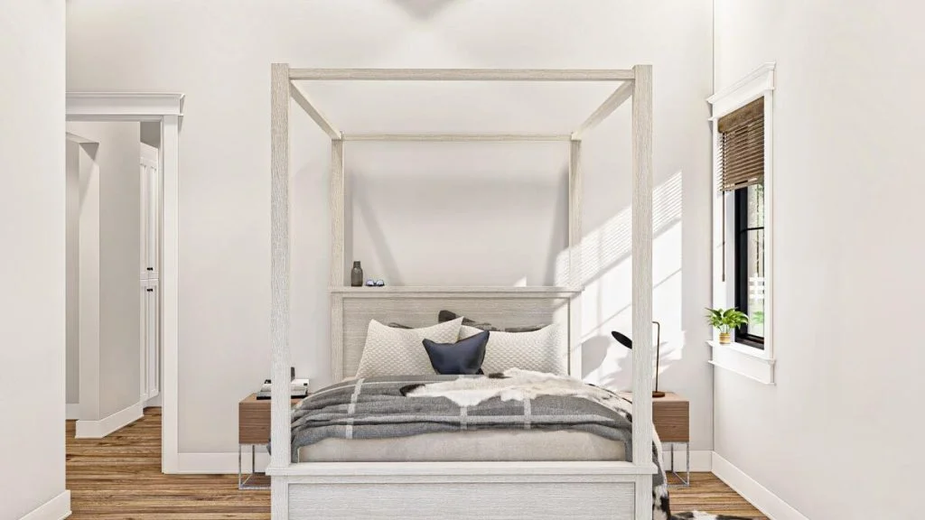 A comfy bedroom shows a double bed with a canopy and 2 small wooden tables on each side