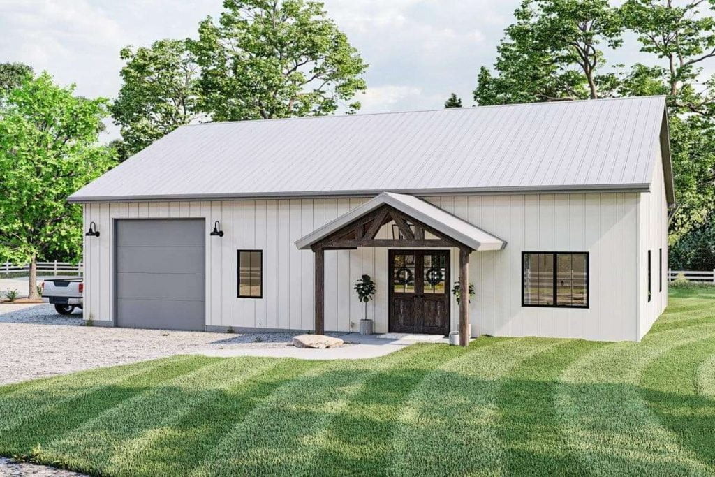 The front view shows stone pathway, covered porch with a wooden column, and a metal garage door