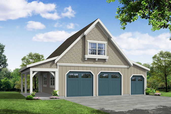 Front view of the Absolute Economical Barndo showcasing the garage doors along the clear pathway. 
