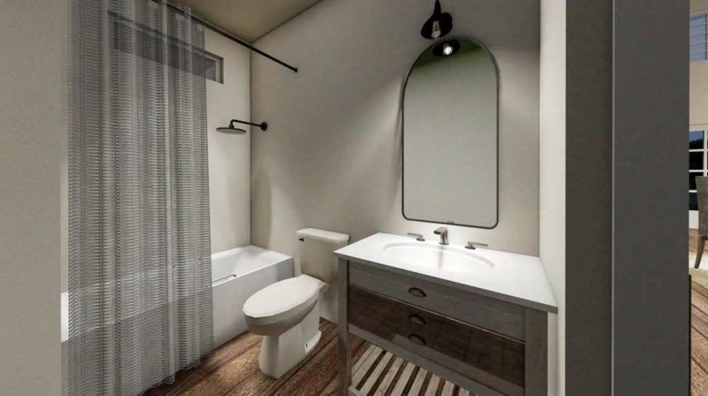 Bathroom with shower bathtub, toilet, mirror, and faucet.