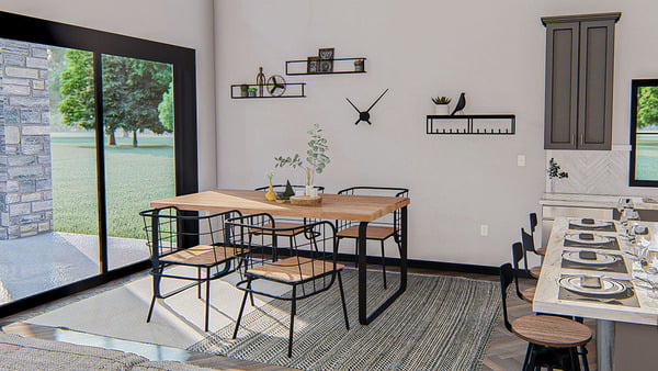 The dining area, furnished with a table set for 4 people and minimalistic wall decor.