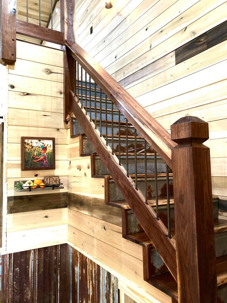 The stairs lead to the second floor, all out of wood for a more rustic feel.
