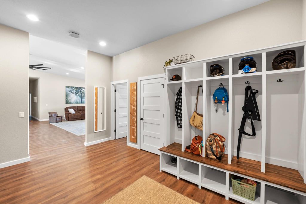 Mudroom furnished with cabinets for extra storage