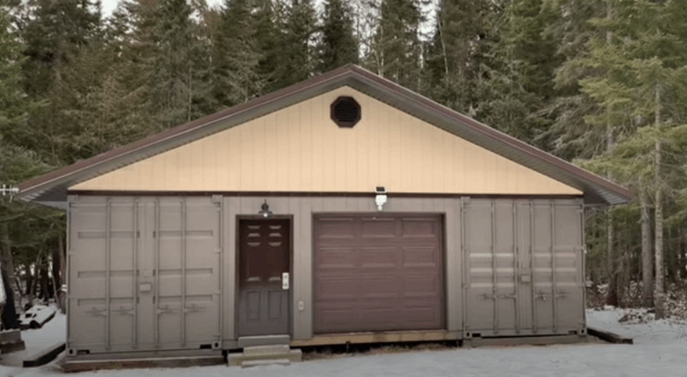 A custom shipping container garage build with a workshop