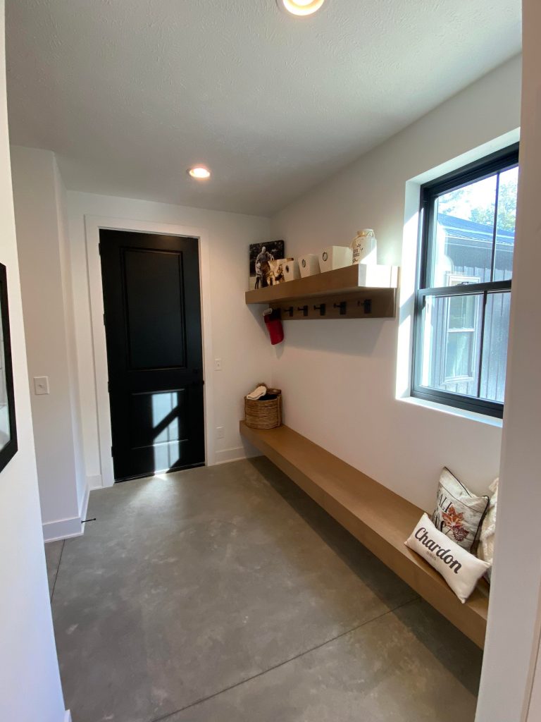 Mudroom, with a floating bench and shelves