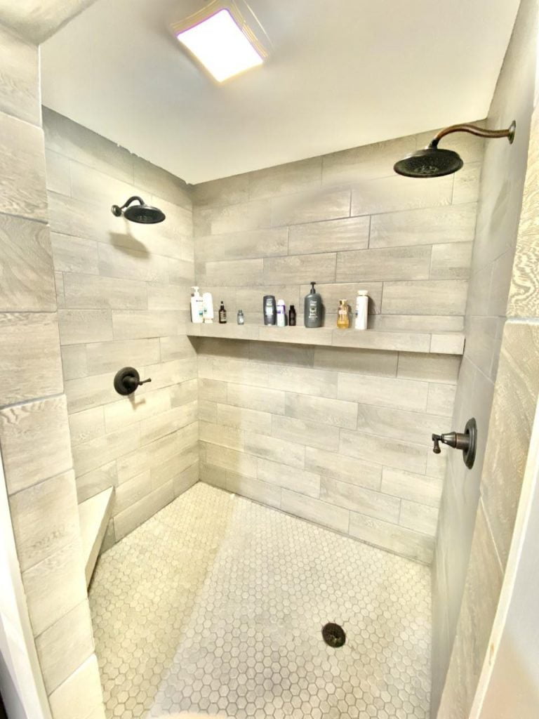 Spacious tiled shower room