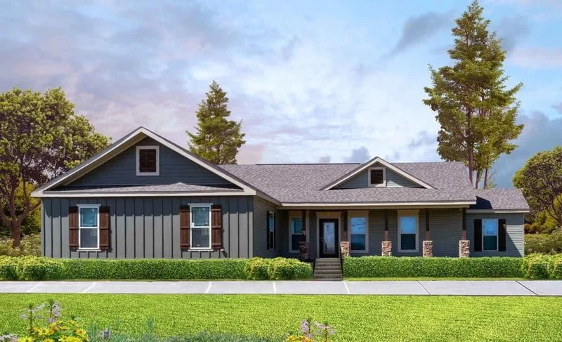 A single-story white home with light grey accents, featuring large windows, a glass front door, a small stone staircase, and a light grey roof. The light grey and white colors are well-balanced and complement each other. The small stone staircase adds a touch of elegance to the design.