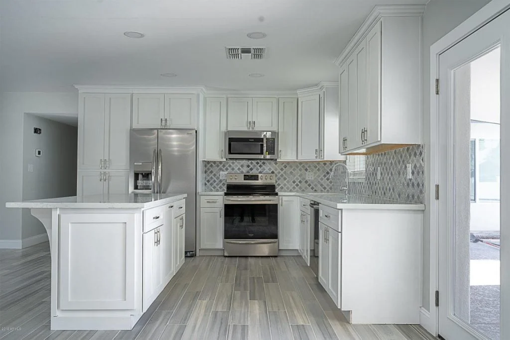 An immaculate white Kitchen