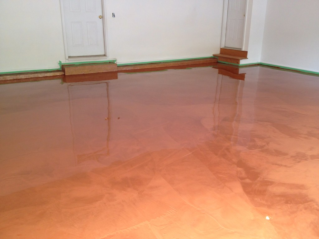 An epoxy finish adds beauty to a hunk of plain concrete and gives it a layer of added protection