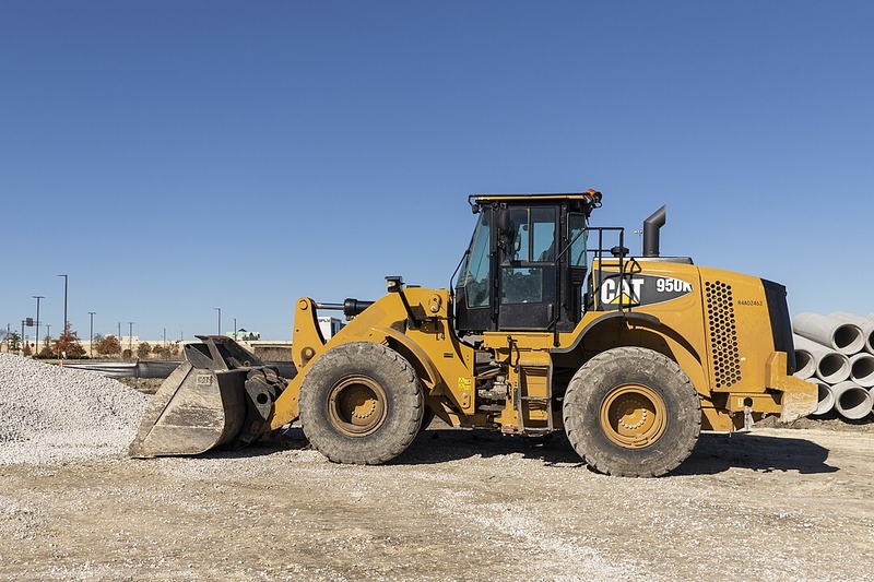 wheel bulldozer taking center stage on a construction site, showcasing its versatility and agility. 