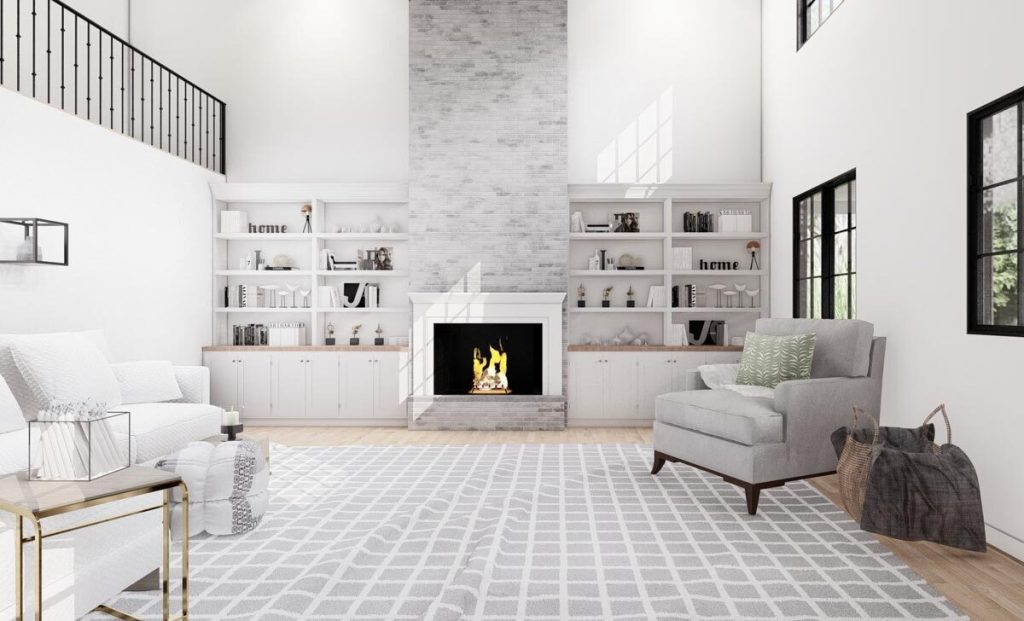 View of the living room showcasing the white marble fireplace and two sofas