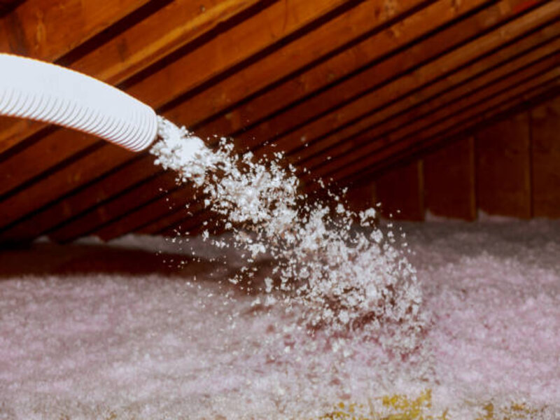 An image showcasing a blow-in insulation installation.