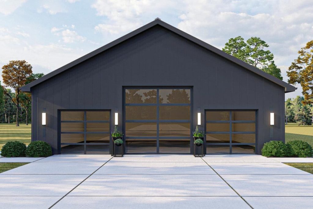 A closer look at the massive 3-car garage, highlighting a large bay with an oversized door specifically designed to accommodate RVs.