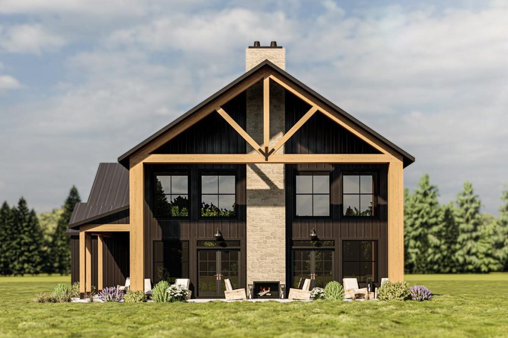 Front view of the enchanting loft barndominium with a outdoor fireplace