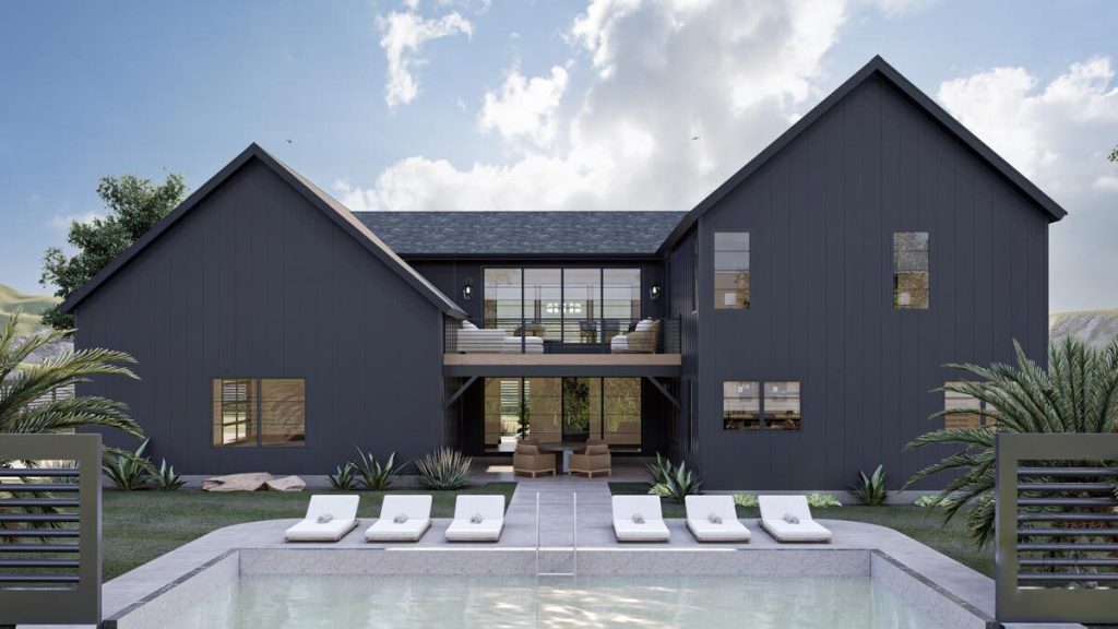 Rear view of the Exquisite Contemporary Barndominium with a pool.