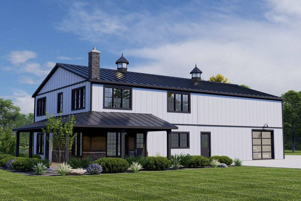 This image captures the front elevation of the Barndominium, offering a clear view of its unique L-shaped porch design that extends a warm and inviting welcome. Adjacently, a spacious car garage complements the overall structure, combining practicality with aesthetic appeal.