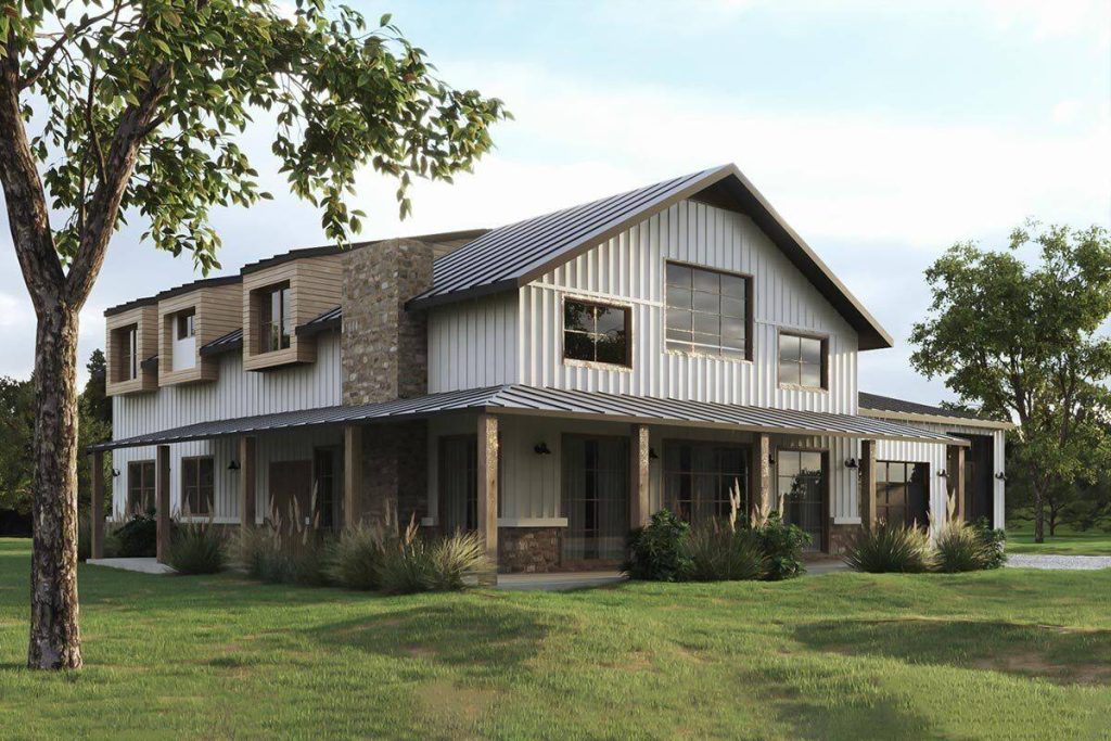 An angled left-side view of the modern barndominium, drawing attention to the main entrance and the expansive covered porch that wraps around the structure. This unique perspective highlights the design and inviting outdoor space of the barndominium from this distinctive angle.