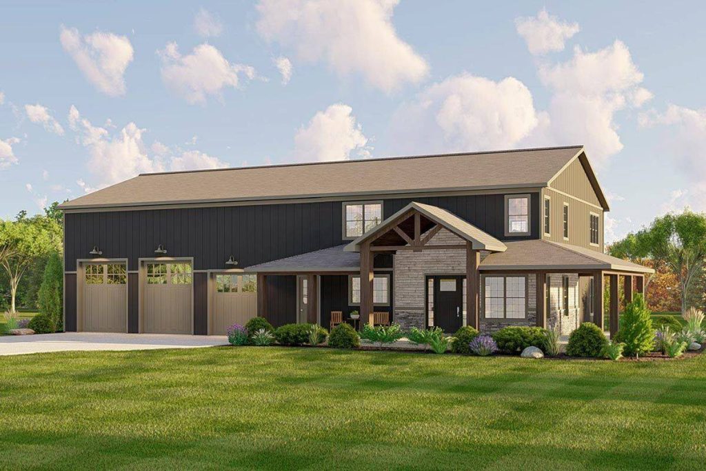 A front-facing view of this classic two-story barndominium, emphasizing the entrance, the inviting covered porch, and the adjacent car garage. This perspective provides a comprehensive look at the key architectural features that contribute to the charm and functionality of the structure.