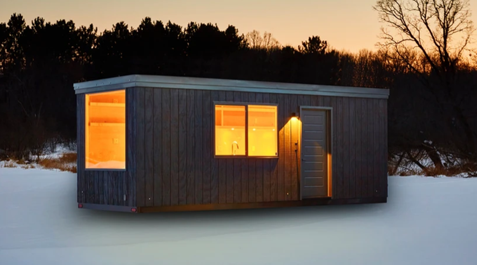 An all-electric (EV) ESCAPE Prefab Home with a clean, natural aesthetic. Image and caption via escapetraveler.net