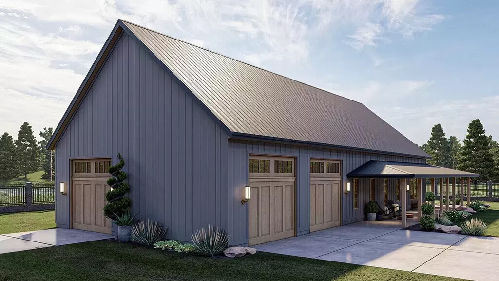 A view of this barndominium showcasing the main entrance of the garage.