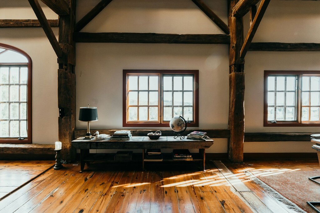 The rustic interior of a pest-free barndominium with wooden flooring 